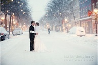 Bride and groom in snow